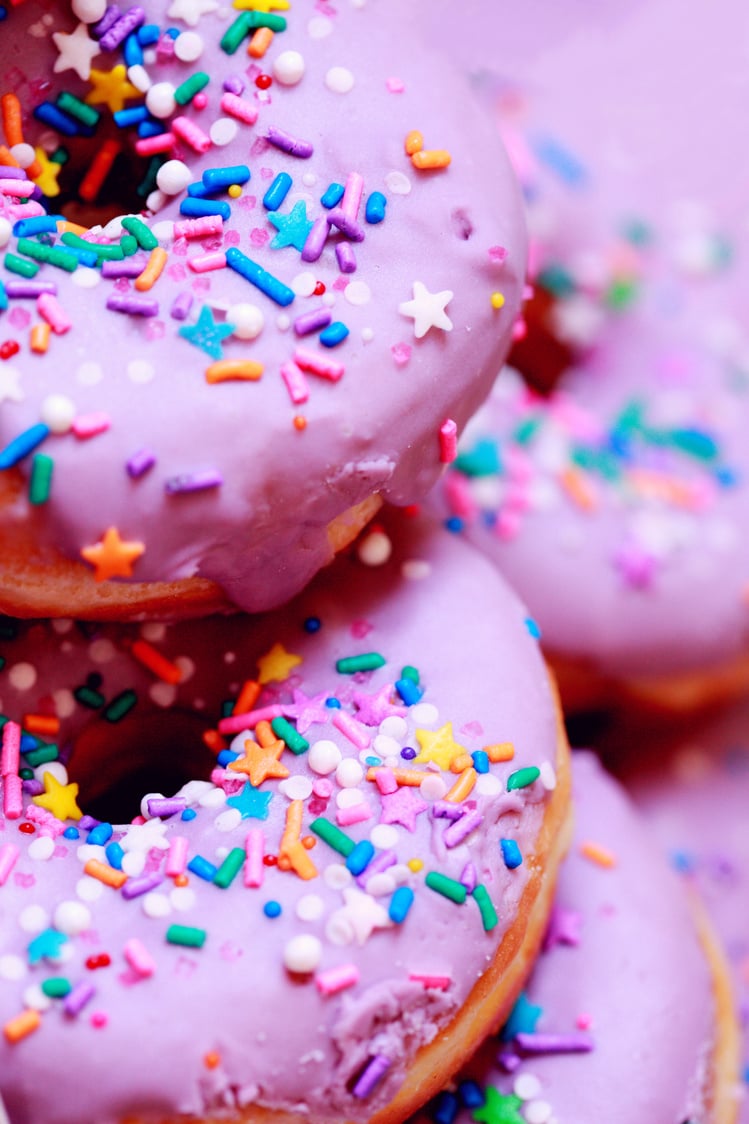 Close-up Photo of Dougnuts with Pink Glaze and Sprinkles